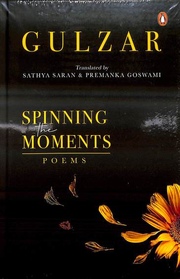 Spinning The Moments : Poems